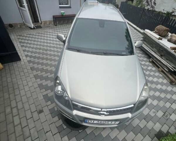 Серый Опель Астра, объемом двигателя 1.6 л и пробегом 216 тыс. км за 2700 $, фото 2 на Automoto.ua