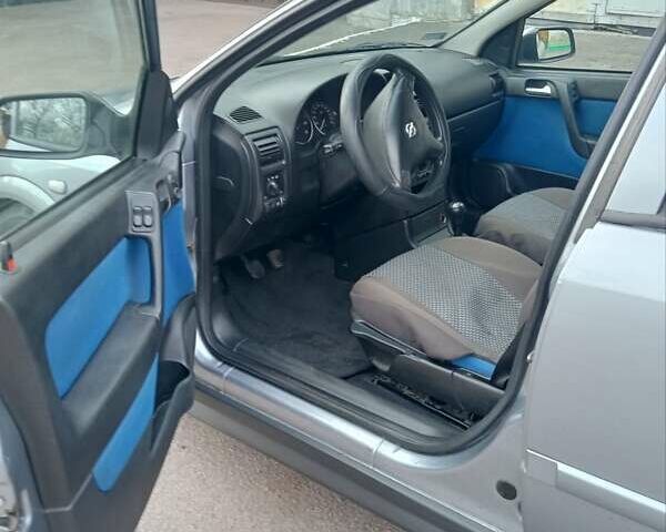 Серый Опель Астра, объемом двигателя 2 л и пробегом 332 тыс. км за 3500 $, фото 8 на Automoto.ua