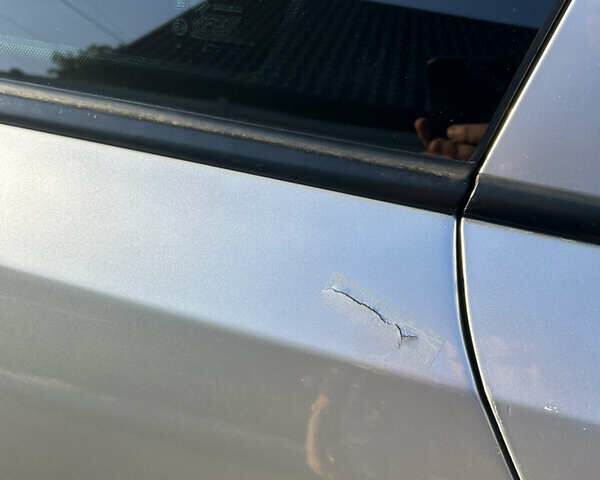 Серый Опель Астра, объемом двигателя 1.6 л и пробегом 190 тыс. км за 5000 $, фото 14 на Automoto.ua