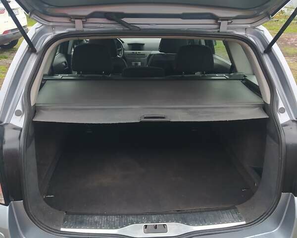 Серый Опель Астра, объемом двигателя 1.6 л и пробегом 265 тыс. км за 5000 $, фото 8 на Automoto.ua