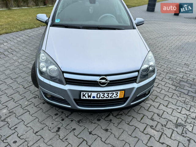 Серый Опель Астра, объемом двигателя 1.8 л и пробегом 211 тыс. км за 4499 $, фото 35 на Automoto.ua