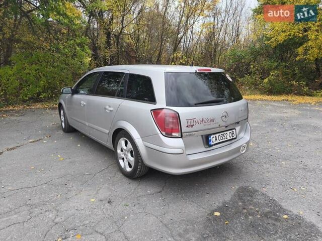 Серый Опель Астра, объемом двигателя 1.8 л и пробегом 349 тыс. км за 3700 $, фото 9 на Automoto.ua