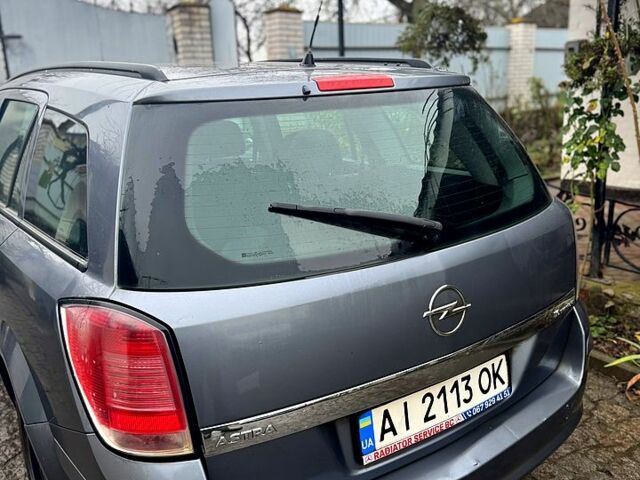 Серый Опель Астра, объемом двигателя 1.6 л и пробегом 180 тыс. км за 4200 $, фото 2 на Automoto.ua