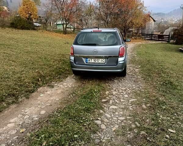 Серый Опель Астра, объемом двигателя 1.4 л и пробегом 250 тыс. км за 4000 $, фото 2 на Automoto.ua