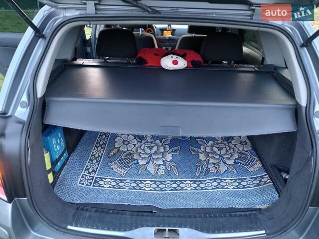 Серый Опель Астра, объемом двигателя 1.6 л и пробегом 240 тыс. км за 3800 $, фото 4 на Automoto.ua