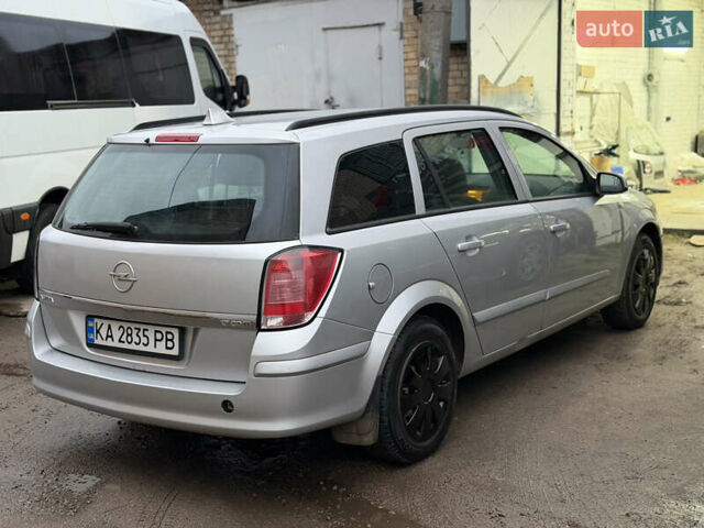 Сірий Опель Астра, об'ємом двигуна 1.69 л та пробігом 257 тис. км за 4550 $, фото 3 на Automoto.ua