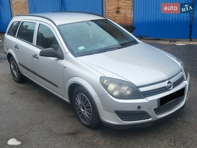 Серый Опель Астра, объемом двигателя 1.7 л и пробегом 250 тыс. км за 2999 $, фото 7 на Automoto.ua