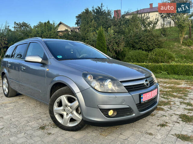 Серый Опель Астра, объемом двигателя 1.8 л и пробегом 210 тыс. км за 4999 $, фото 20 на Automoto.ua