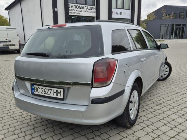 Серый Опель Астра, объемом двигателя 1.7 л и пробегом 379 тыс. км за 3799 $, фото 2 на Automoto.ua