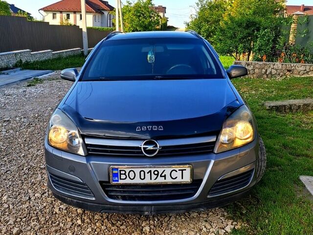 Серый Опель Астра, объемом двигателя 1.6 л и пробегом 262 тыс. км за 4800 $, фото 3 на Automoto.ua