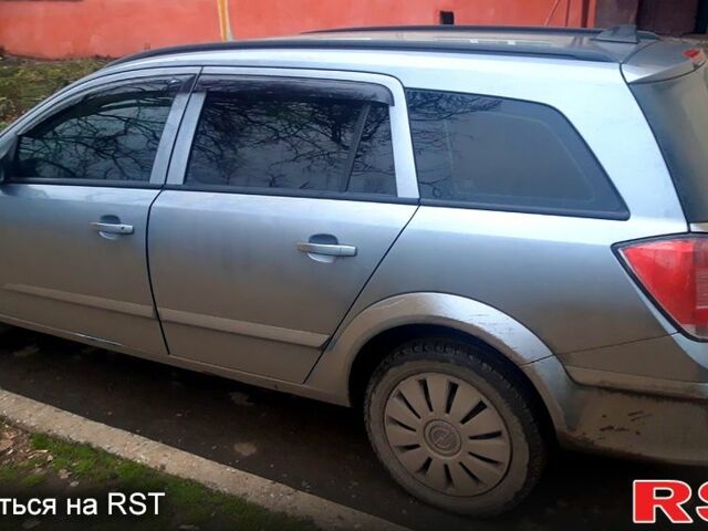 Серый Опель Астра, объемом двигателя 1.6 л и пробегом 229 тыс. км за 5500 $, фото 2 на Automoto.ua