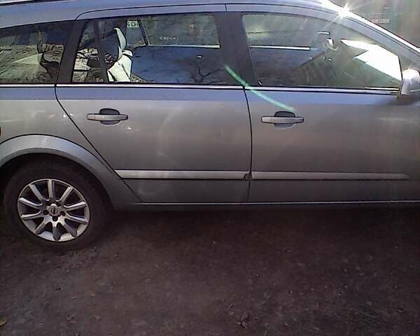 Серый Опель Астра, объемом двигателя 1.6 л и пробегом 390 тыс. км за 4000 $, фото 7 на Automoto.ua