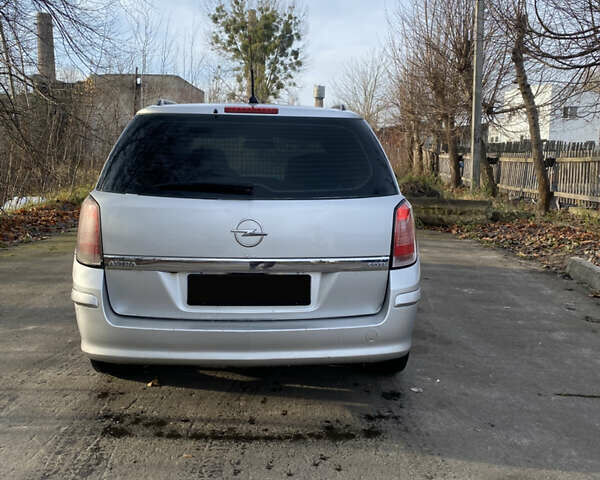 Серый Опель Астра, объемом двигателя 1.3 л и пробегом 360 тыс. км за 2150 $, фото 19 на Automoto.ua