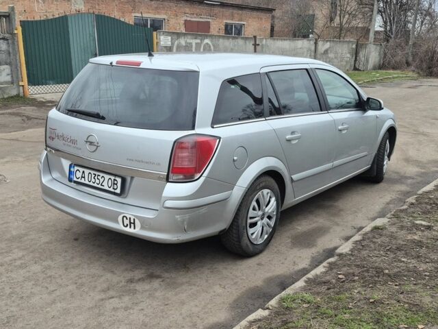 Серый Опель Астра, объемом двигателя 1.8 л и пробегом 350 тыс. км за 4300 $, фото 4 на Automoto.ua