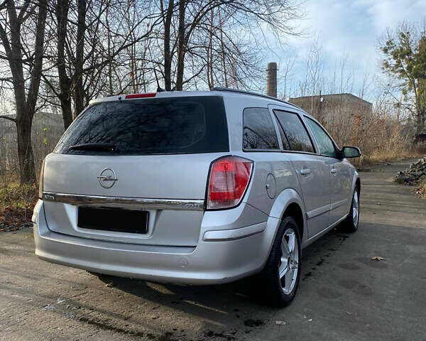 Серый Опель Астра, объемом двигателя 1.3 л и пробегом 330 тыс. км за 2200 $, фото 13 на Automoto.ua