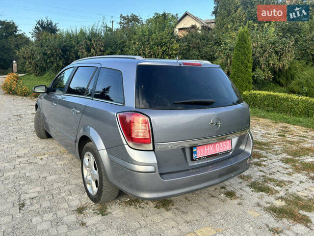 Серый Опель Астра, объемом двигателя 1.8 л и пробегом 210 тыс. км за 4999 $, фото 10 на Automoto.ua