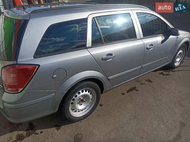 Серый Опель Астра, объемом двигателя 1.6 л и пробегом 230 тыс. км за 5700 $, фото 4 на Automoto.ua