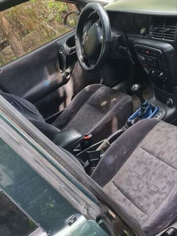 Серый Опель Астра, объемом двигателя 2 л и пробегом 178 тыс. км за 2550 $, фото 1 на Automoto.ua