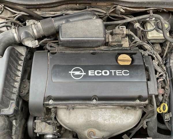 Серый Опель Астра, объемом двигателя 1.6 л и пробегом 221 тыс. км за 5550 $, фото 10 на Automoto.ua