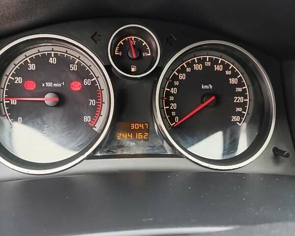 Серый Опель Астра, объемом двигателя 1.4 л и пробегом 250 тыс. км за 4000 $, фото 14 на Automoto.ua