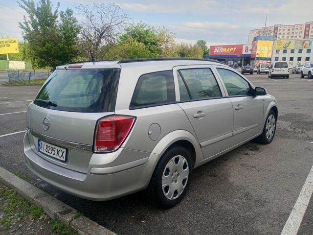 Серый Опель Астра, объемом двигателя 1.6 л и пробегом 264 тыс. км за 4700 $, фото 2 на Automoto.ua