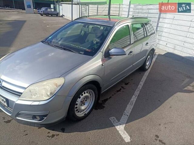 Серый Опель Астра, объемом двигателя 1.6 л и пробегом 230 тыс. км за 5700 $, фото 1 на Automoto.ua
