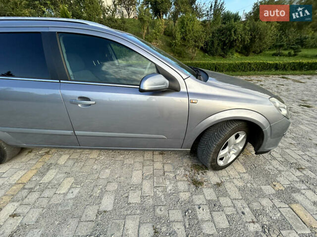 Серый Опель Астра, объемом двигателя 1.8 л и пробегом 210 тыс. км за 4999 $, фото 25 на Automoto.ua