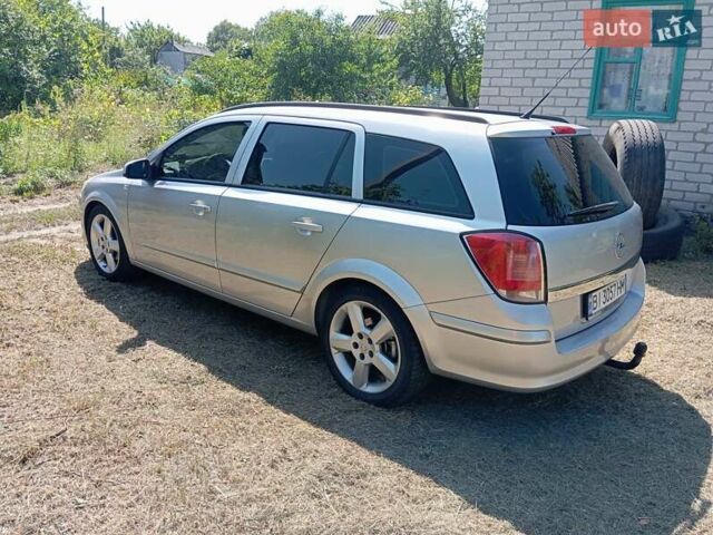 Серый Опель Астра, объемом двигателя 1.7 л и пробегом 296 тыс. км за 5000 $, фото 11 на Automoto.ua