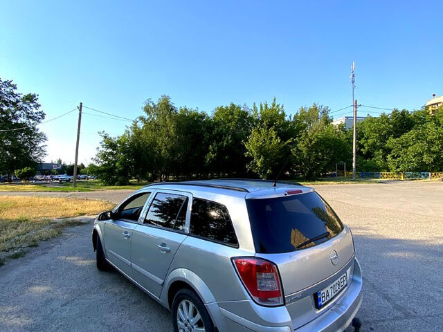 Серый Опель Астра, объемом двигателя 1.4 л и пробегом 280 тыс. км за 4700 $, фото 6 на Automoto.ua