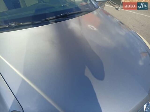 Серый Опель Астра, объемом двигателя 1.6 л и пробегом 230 тыс. км за 5700 $, фото 16 на Automoto.ua