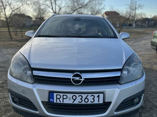Серый Опель Астра, объемом двигателя 1.9 л и пробегом 380 тыс. км за 2900 $, фото 2 на Automoto.ua