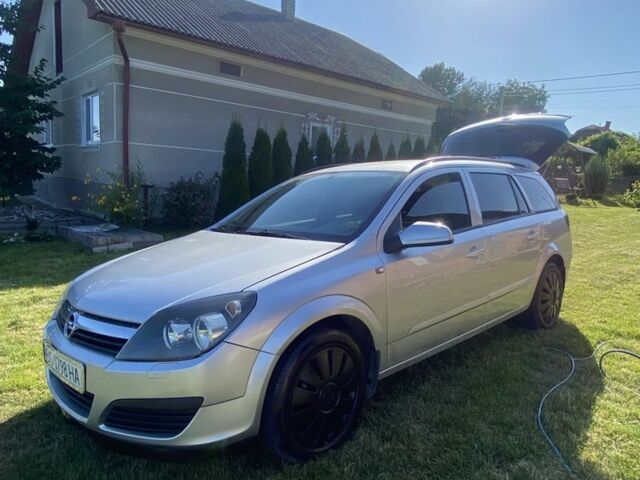 Серый Опель Астра, объемом двигателя 1.9 л и пробегом 235 тыс. км за 4300 $, фото 4 на Automoto.ua