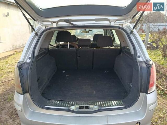 Серый Опель Астра, объемом двигателя 1.7 л и пробегом 255 тыс. км за 4300 $, фото 6 на Automoto.ua