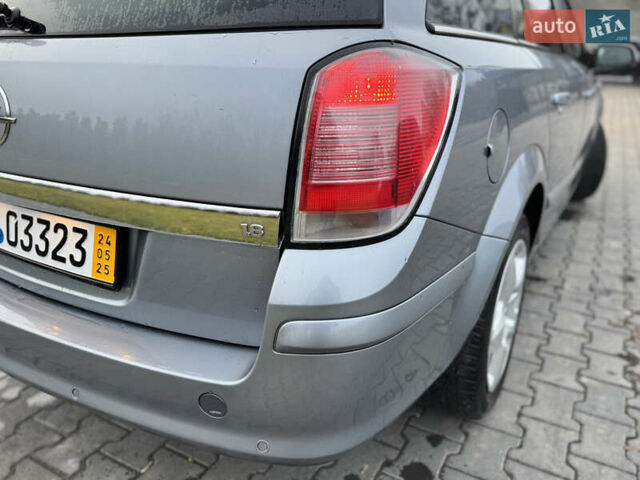 Серый Опель Астра, объемом двигателя 1.8 л и пробегом 211 тыс. км за 4499 $, фото 19 на Automoto.ua