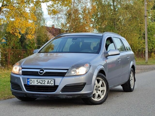 Серый Опель Астра, объемом двигателя 1.2 л и пробегом 250 тыс. км за 3650 $, фото 2 на Automoto.ua