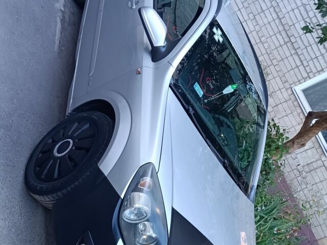 Серый Опель Астра, объемом двигателя 1.9 л и пробегом 330 тыс. км за 1850 $, фото 1 на Automoto.ua