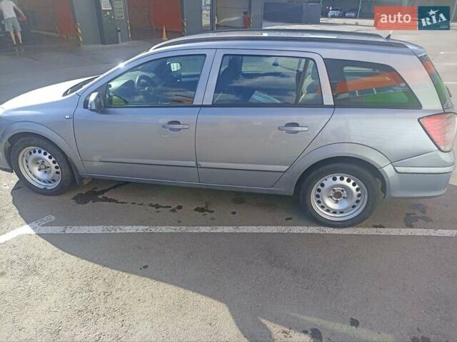 Серый Опель Астра, объемом двигателя 1.6 л и пробегом 230 тыс. км за 5700 $, фото 2 на Automoto.ua