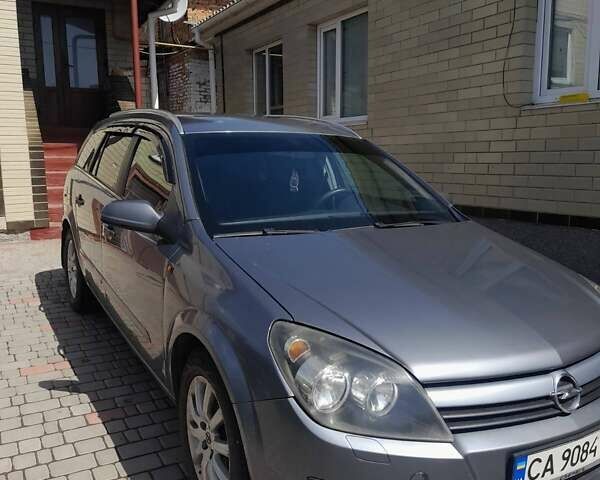 Серый Опель Астра, объемом двигателя 1.6 л и пробегом 279 тыс. км за 4500 $, фото 8 на Automoto.ua