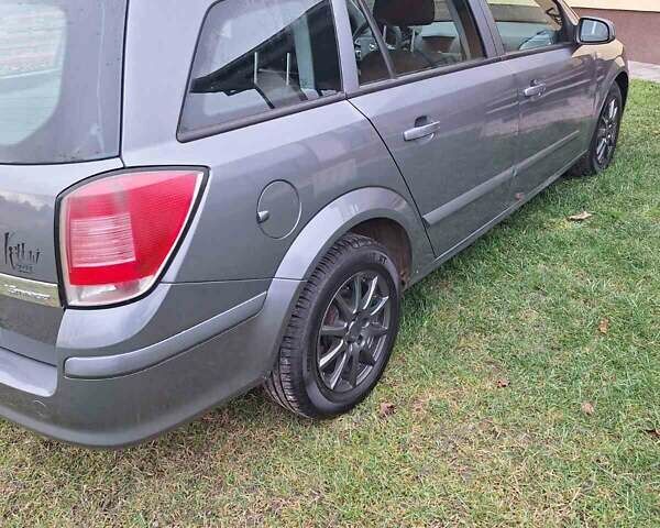 Сірий Опель Астра, об'ємом двигуна 1.6 л та пробігом 256 тис. км за 4555 $, фото 3 на Automoto.ua