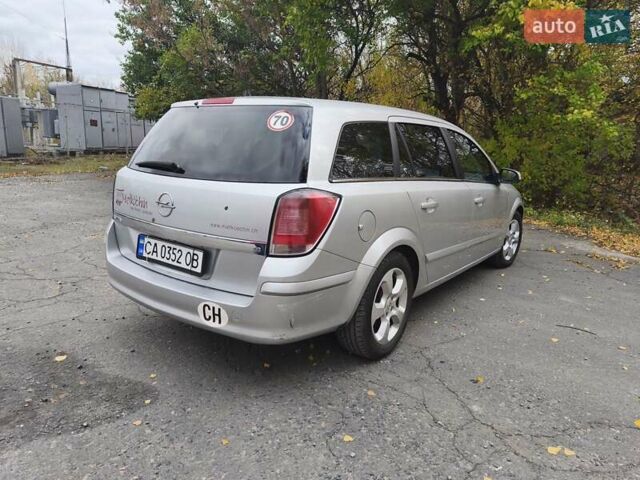 Серый Опель Астра, объемом двигателя 1.8 л и пробегом 349 тыс. км за 3700 $, фото 6 на Automoto.ua