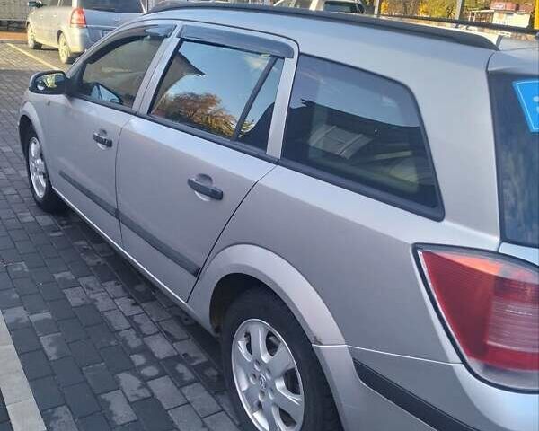 Серый Опель Астра, объемом двигателя 1.6 л и пробегом 220 тыс. км за 5000 $, фото 2 на Automoto.ua