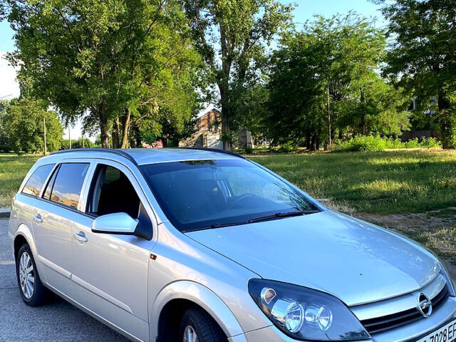 Серый Опель Астра, объемом двигателя 1.4 л и пробегом 280 тыс. км за 4700 $, фото 1 на Automoto.ua