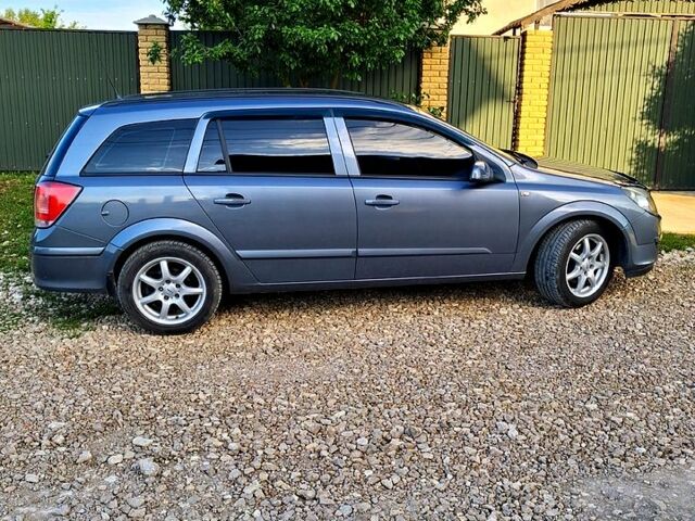 Серый Опель Астра, объемом двигателя 1.6 л и пробегом 262 тыс. км за 4800 $, фото 2 на Automoto.ua