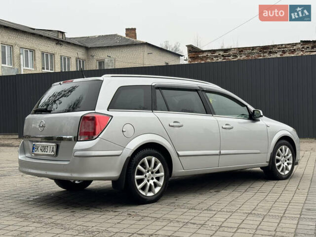 Серый Опель Астра, объемом двигателя 1.6 л и пробегом 215 тыс. км за 4300 $, фото 7 на Automoto.ua