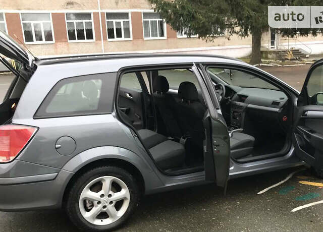 Серый Опель Астра, объемом двигателя 1.8 л и пробегом 246 тыс. км за 4700 $, фото 14 на Automoto.ua