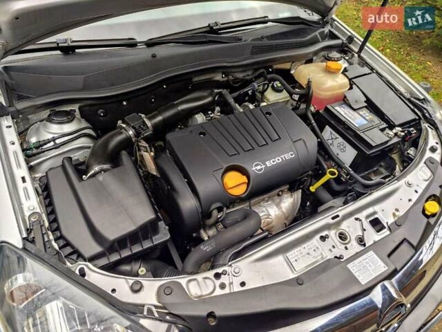 Серый Опель Астра, объемом двигателя 1.8 л и пробегом 286 тыс. км за 5400 $, фото 13 на Automoto.ua