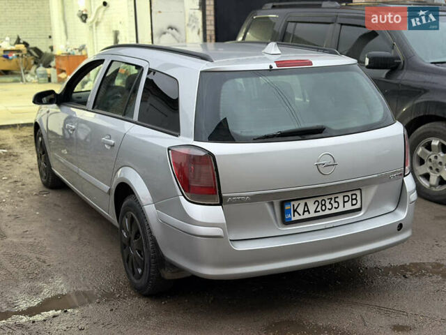 Сірий Опель Астра, об'ємом двигуна 1.69 л та пробігом 257 тис. км за 4550 $, фото 4 на Automoto.ua