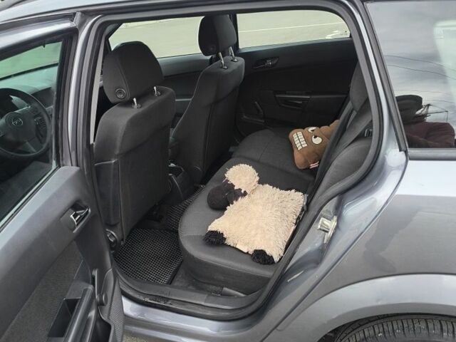 Серый Опель Астра, объемом двигателя 1.8 л и пробегом 250 тыс. км за 4300 $, фото 7 на Automoto.ua