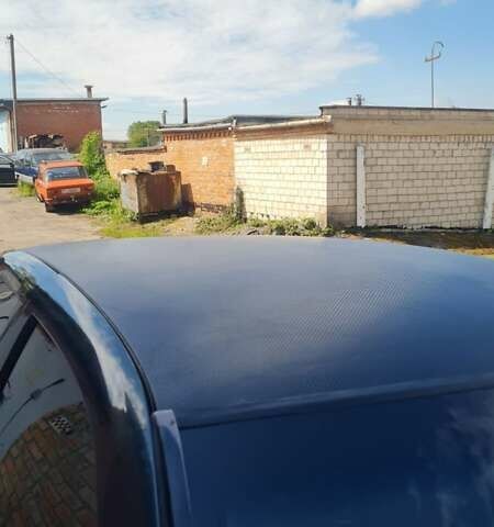 Серый Опель Астра, объемом двигателя 2 л и пробегом 178 тыс. км за 2550 $, фото 3 на Automoto.ua