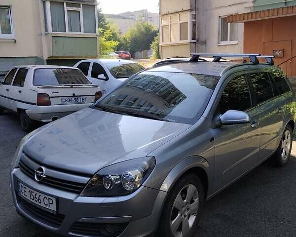 Серый Опель Астра, объемом двигателя 1.6 л и пробегом 230 тыс. км за 5500 $, фото 7 на Automoto.ua